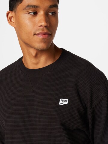 PUMA Sweatshirt in Schwarz