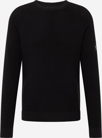 Pull-over Calvin Klein Jeans en noir : devant