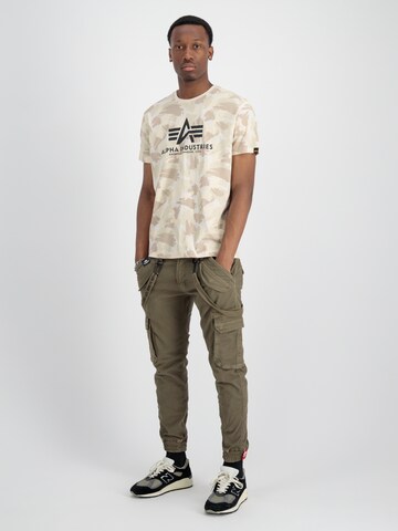 ALPHA INDUSTRIES Tapered Cargo trousers in Green