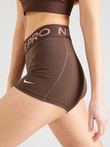 NIKE Skinny Workout Pants 'Pro' in Brown