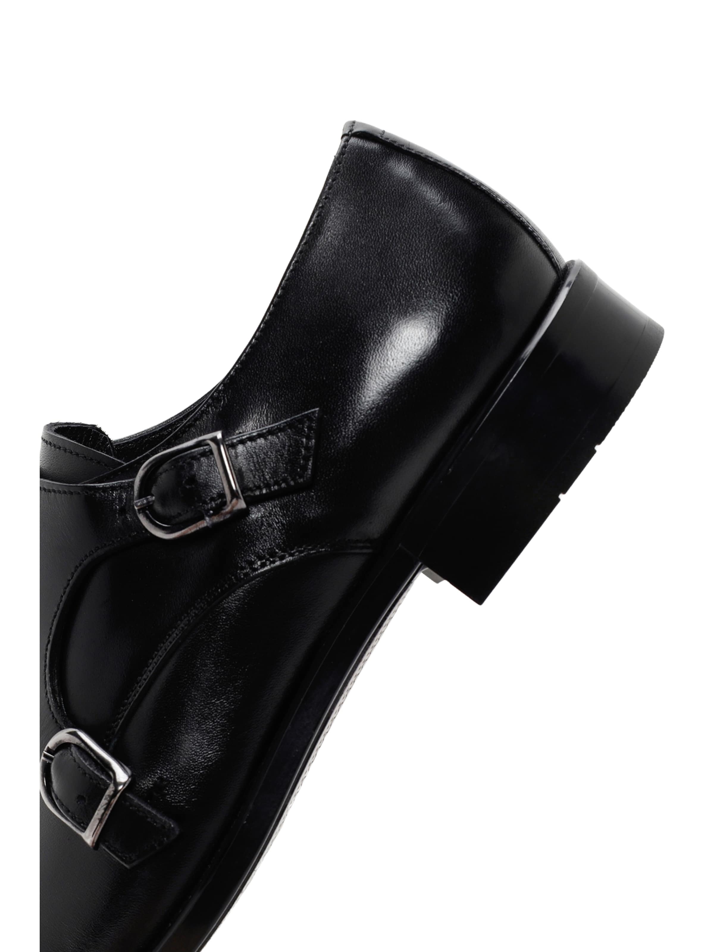 Slipper di Derimod in nero