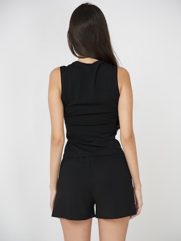 Top 'Lounge Tank - Black' di LÉGÈRE in nero