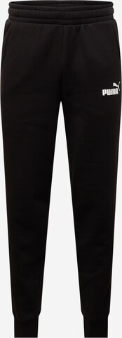 PUMA Tapered Sportbroek in Zwart: voorkant