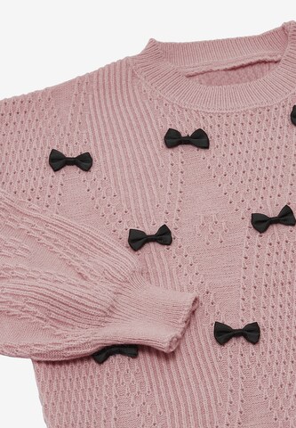 Pull-over swirly en rose