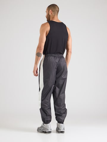 Nike Sportswear Tapered Pants in Black