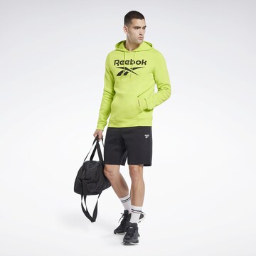 Reebok - Sweatshirt de desporto 'Identity' em amarelo