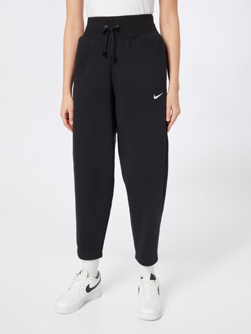 Nike Sportswear Tapered Broek 'PHNX FLC' in Zwart: voorkant