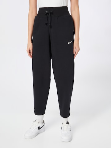 Nike Sportswear Tapered Broek 'PHNX FLC' in Zwart: voorkant