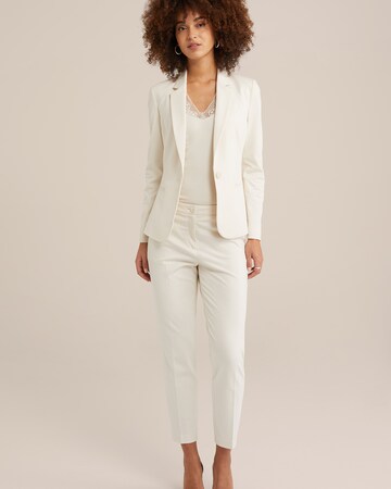 Slimfit Pantaloni con piega frontale di WE Fashion in beige