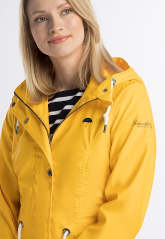 Manteau fonctionnel Schmuddelwedda en jaune