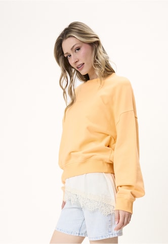 OH APRIL Sweatshirt 'Soft Life' in Orange