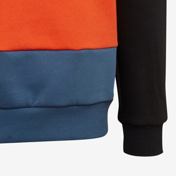 ADIDAS SPORTSWEAR Αθλητική μπλούζα φούτερ 'Colorblock Fleece' σε μαύρο