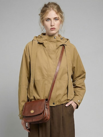 The Bridge Crossbody Bag in Green: front