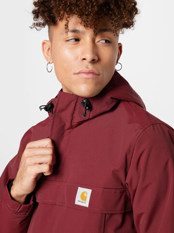 Carhartt WIPRegular Fit Prijelazna jakna 'Nimbus' - ljubičasta boja