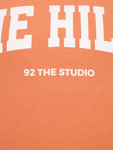 92 The Studio Sweatshirt in Oranje