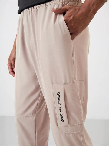 Tommy Life tavaline Spordipüksid 'Jogginghose', värv beež
