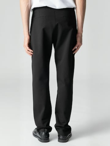TEESHOPPEN - regular Pantalón ' Wide ' en negro