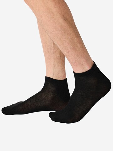 Nur Die Socks in Black: front