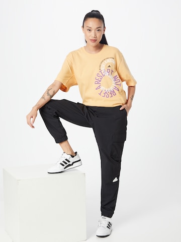 ADIDAS BY STELLA MCCARTNEY - Camiseta funcional en amarillo