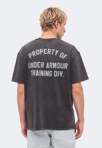 UNDER ARMOUR Performance Shirt 'PROPERTY OF UA' in Black: front