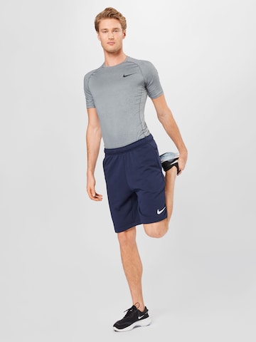 NIKE Normální Sportovní kalhoty – modrá