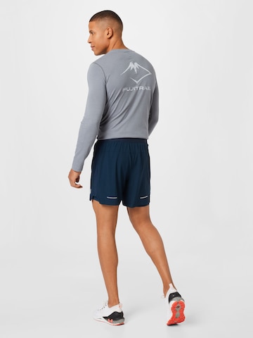 ASICS Regular Workout Pants 'Road' in Blue