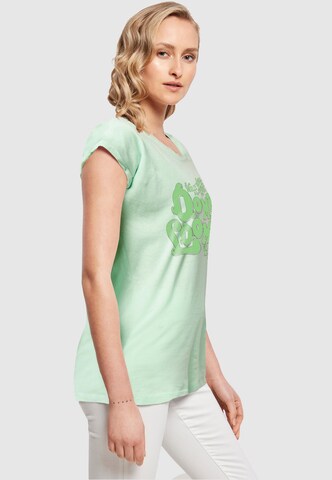 ABSOLUTE CULT T-Shirt 'Willy Wonka And The Chocolate Factory - Oompa Loompa Land' in Grün