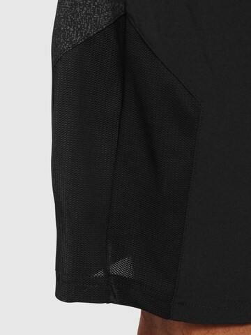Regular Pantalon de sport Smilodox en noir