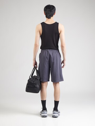 Champion Authentic Athletic Apparel - Loosefit Pantalón en lila