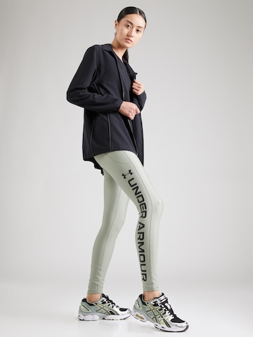 Skinny Pantaloni sport de la UNDER ARMOUR pe verde