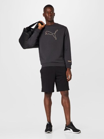 PUMA - Sweatshirt de desporto em preto