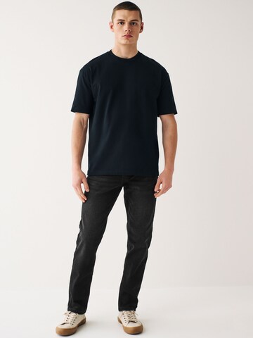 Next Slim fit Jeans 'Essential' in Black