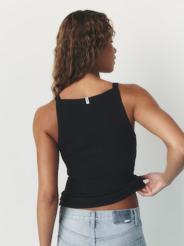 Haut self. en noir