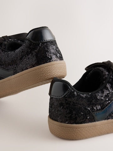 Baskets Next en noir