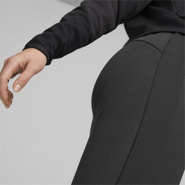 PUMA Slimfit Sportbroek 'EVOSTRIPE' in Zwart