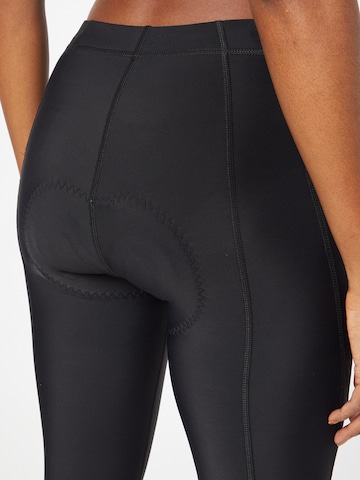 ZIENER - Skinny Calças de desporto 'Nebia' em preto