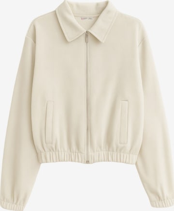 Veste mi-saison MixRay en beige : devant