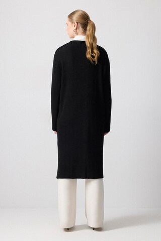 Touche Prive Strickjacke in Schwarz