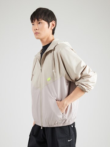 Nike Sportswear Välikausitakki värissä beige