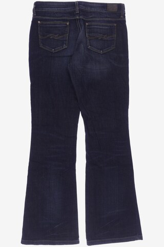 TOMMY HILFIGER Jeans in 29 in Blue
