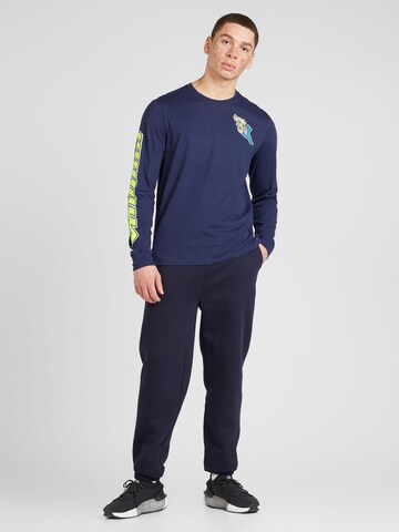 Tricou funcțional 'RUN EVERYWHERE' de la UNDER ARMOUR pe albastru