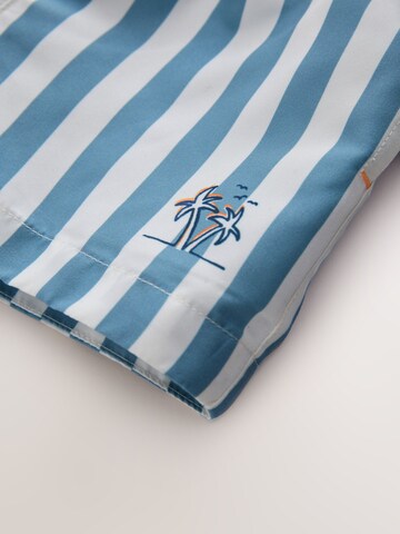 Next UV-suoja värissä sininen