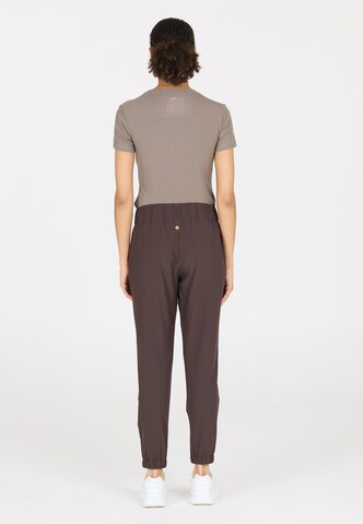Athlecia Tapered Sports trousers 'Austberg' in Brown