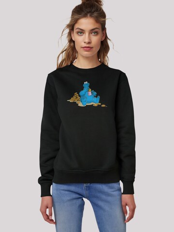 F4NT4STIC Sweatshirt 'Sesamstraße Cookie Monster Coockietime' in Schwarz: Vorderseite