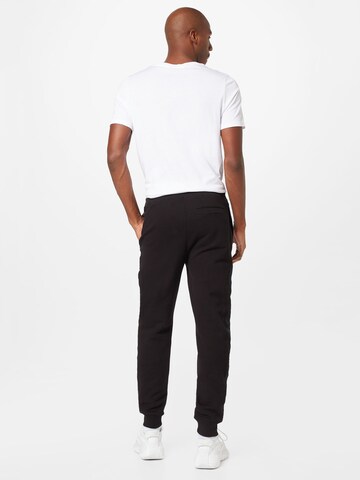 HUGO Red Tapered Pants 'Dumquat' in Black