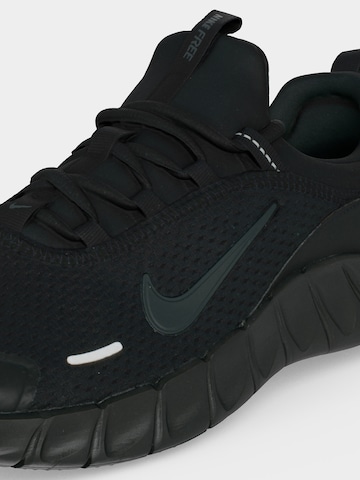 Chaussure de sport 'Free Ride' NIKE en noir