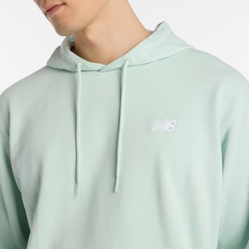 Sweat-shirt 'Essentials' new balance en vert