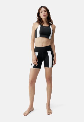Born Living Yoga Skinny Sporthose 'Bindi' in Schwarz: Vorderseite