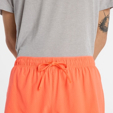 Regular Pantalon de sport 'RC 5' new balance en orange