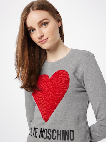 Sweat-shirt 'FELPA' Love Moschino en gris